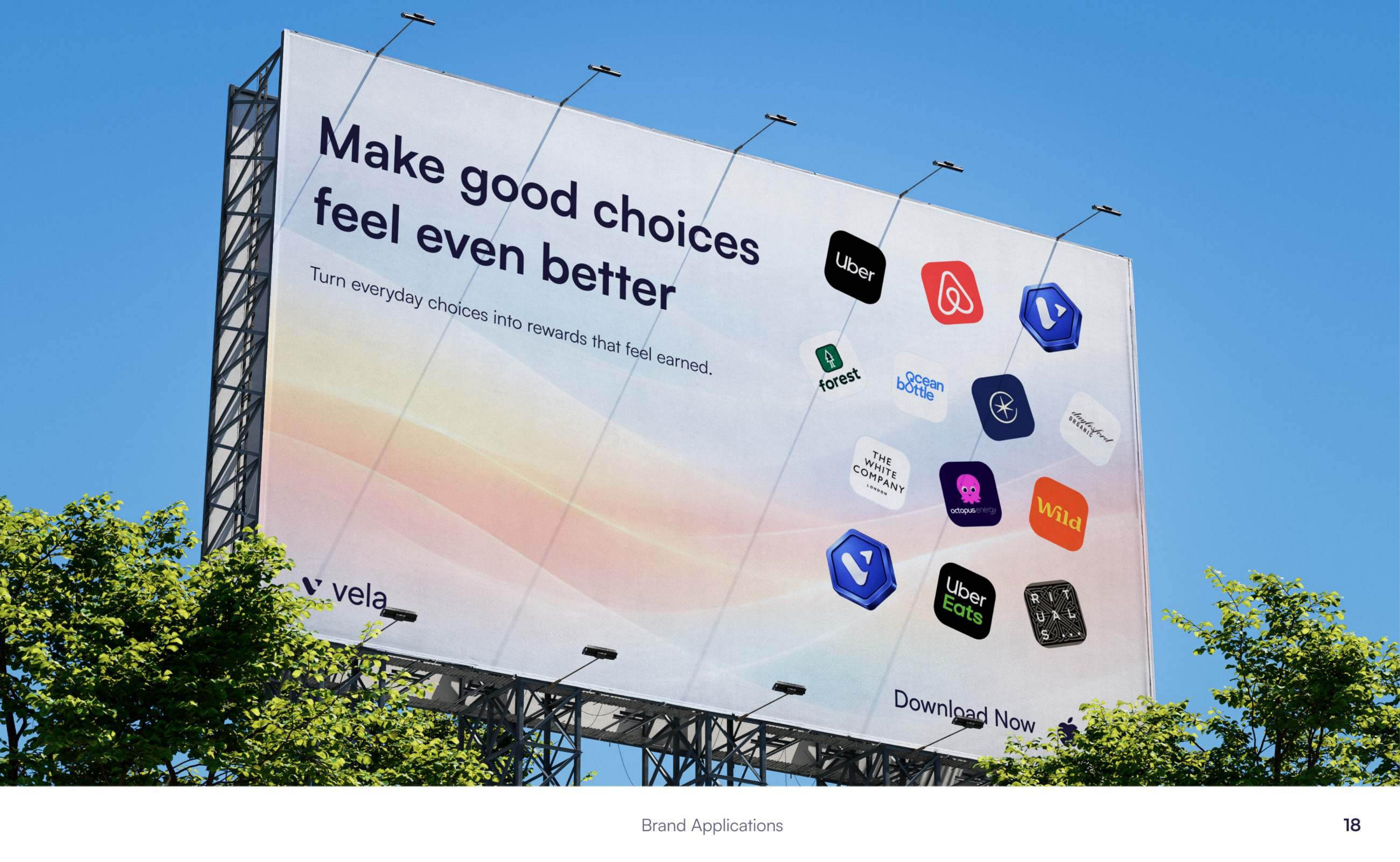 Vela billboard showing rewards partner logos — Uber, Airbnb, The White Company, Octopus Energy, Rituals and more